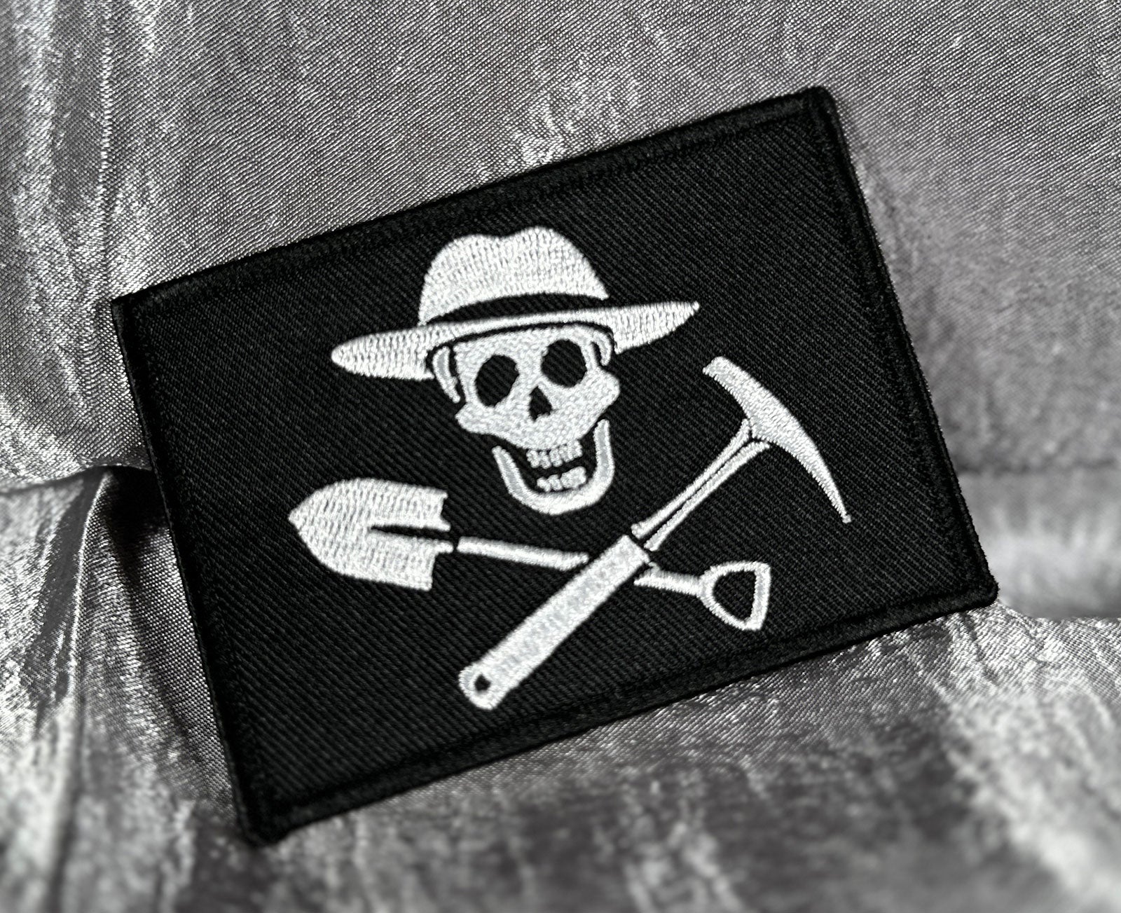 Jolly Rockhound Embroidered Iron-On Patch